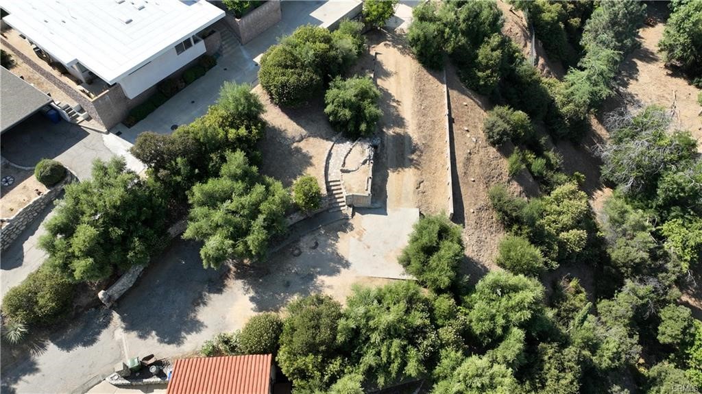 4064 Olive Knoll Place Claremont, CA 91711 - Photo 22 of 26 an aerial view of a house with a yard and garden