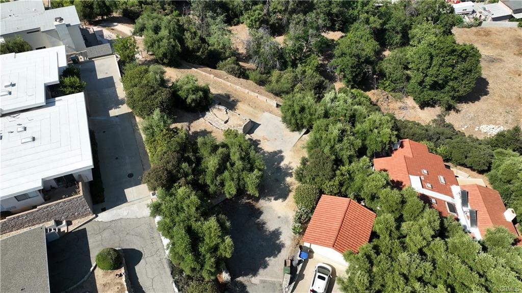 4064 Olive Knoll Place Claremont, CA 91711 - Photo 4 of 26 an aerial view of house with yard and swimming pool