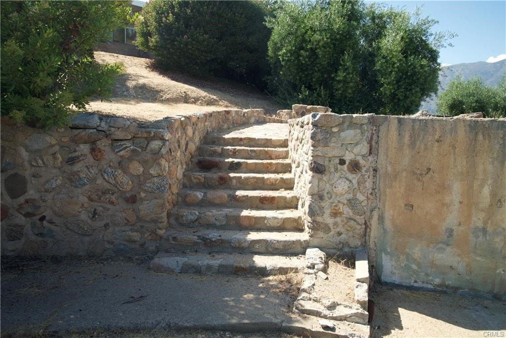4064 Olive Knoll Place Claremont, CA 91711 - Photo 7 of 26 a view of a pathway with a yard