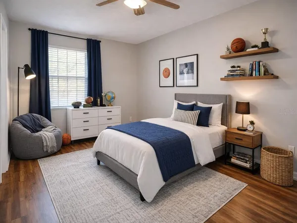 a bedroom with a bed and a couch