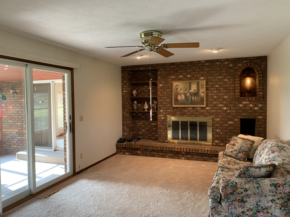 4350 North Armour Road Stillman Valley, IL 61084 - Photo 7 of 19 a living room with furniture and floor to ceiling windows