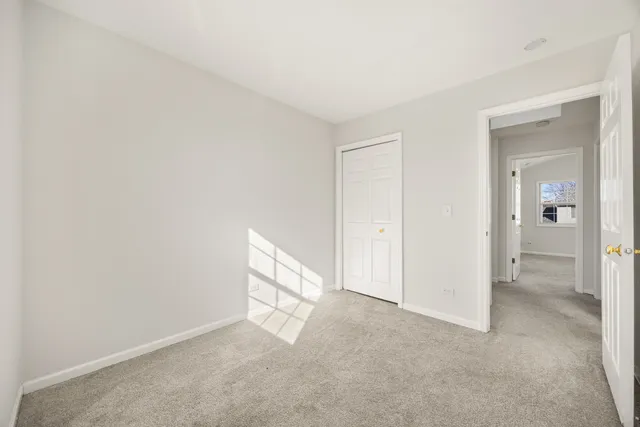 an empty room with mirror