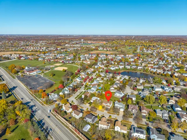 an aerial view of residential building and ocean