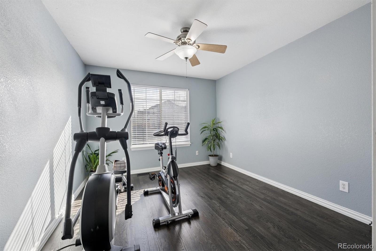 3431 Grove Street Brighton, CO 80601 - Photo 24 of 34 a view of a workspace with furniture and a window