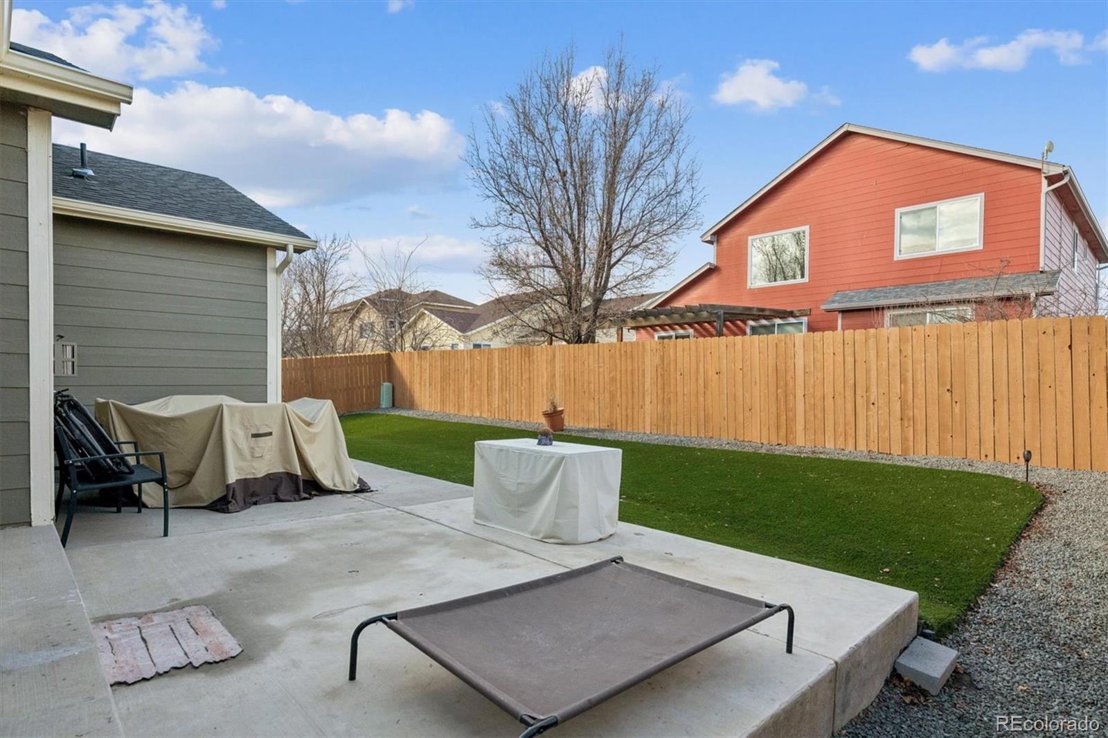 3431 Grove Street Brighton, CO 80601 - Photo 34 of 34 swimming pool view with a seating space