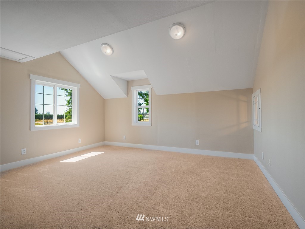 16930 Sheldon Lane Southwest Rochester, WA 98579 - Photo 14 of 24 an empty room with windows
