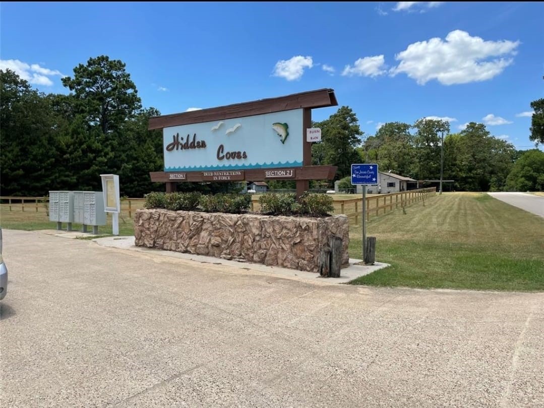 Tbd Hickory Trail Point Blank, TX 77364 - Photo 2 of 4 a front view of a house with a yard