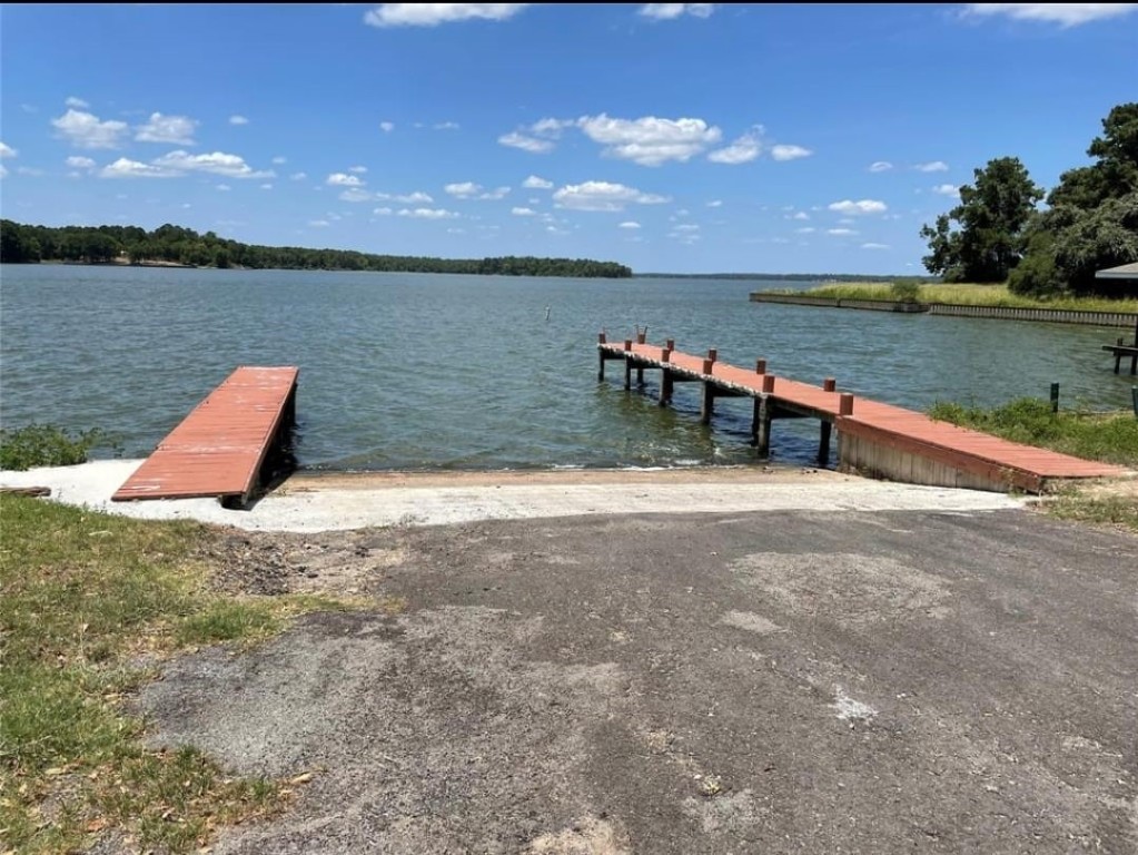 Tbd Hickory Trail Point Blank, TX 77364 - Photo 3 of 4 a view of a lake with a yard