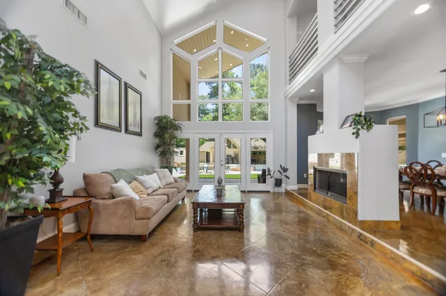 a kitchen with stainless steel appliances granite countertop a sink and a counter space