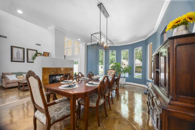 a kitchen with lots of counter top space and stainless steel appliances