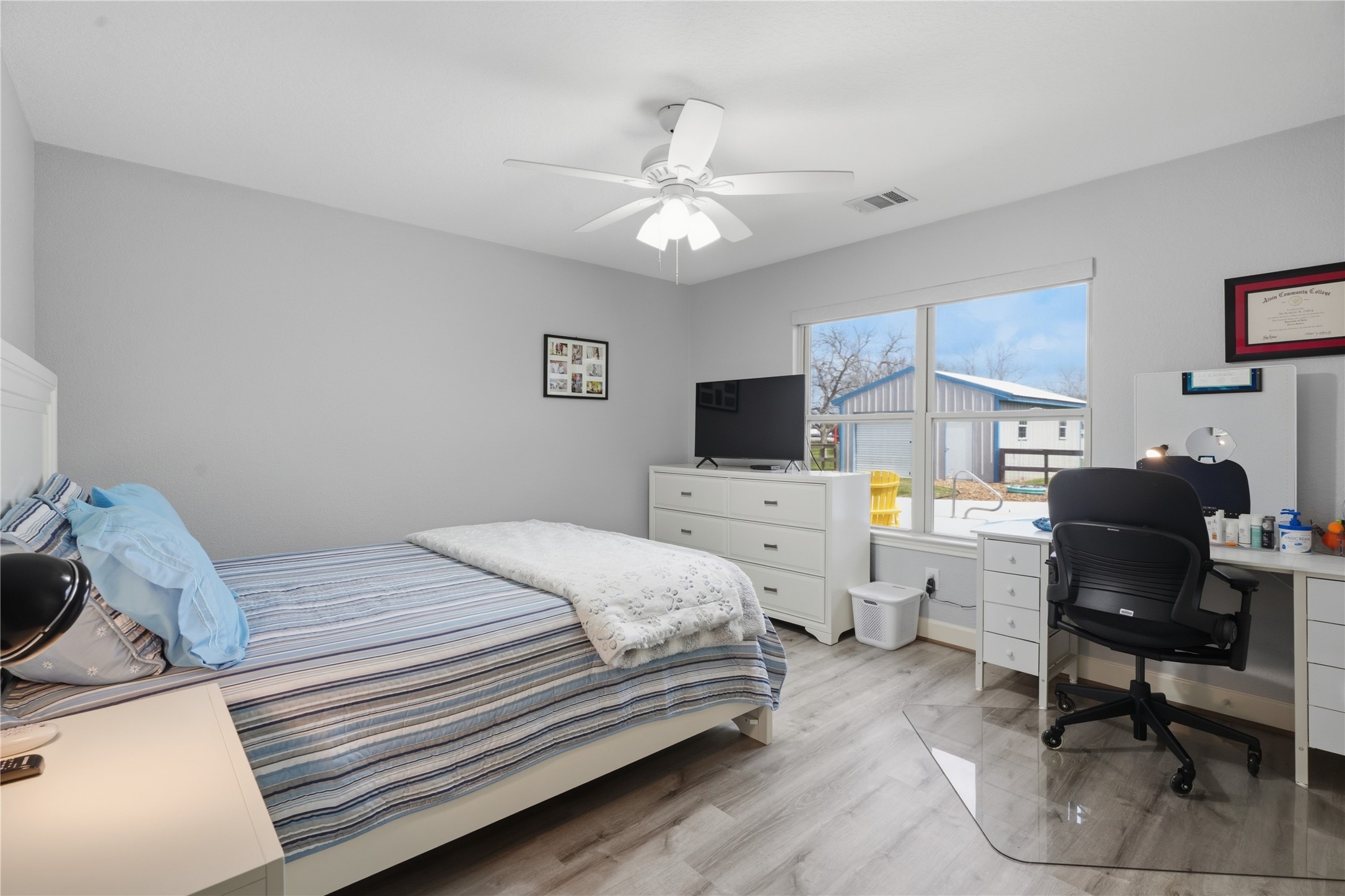 615 Lilley Road Alvin, TX 77511 - Photo 20 of 42 One of two secondary bedrooms; this one overlooks the pool.