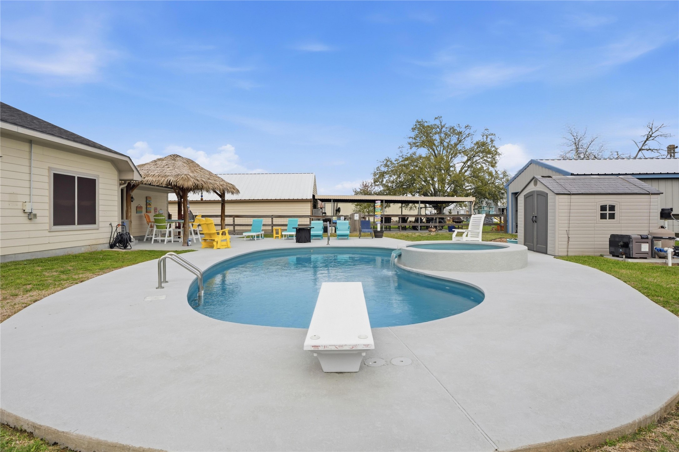 615 Lilley Road Alvin, TX 77511 - Photo 28 of 42 24K gallon fiberglass saltwater pool with jump board and heater.