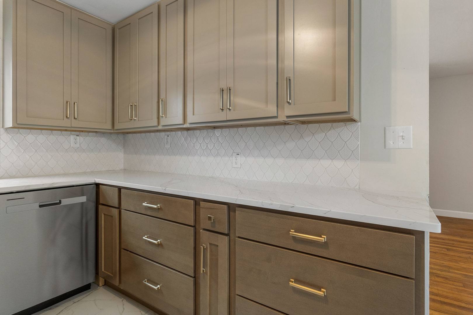 807 South Hamilton Street Monticello, IL 61856 - Photo 17 of 39 a kitchen with cabinets and white appliances
