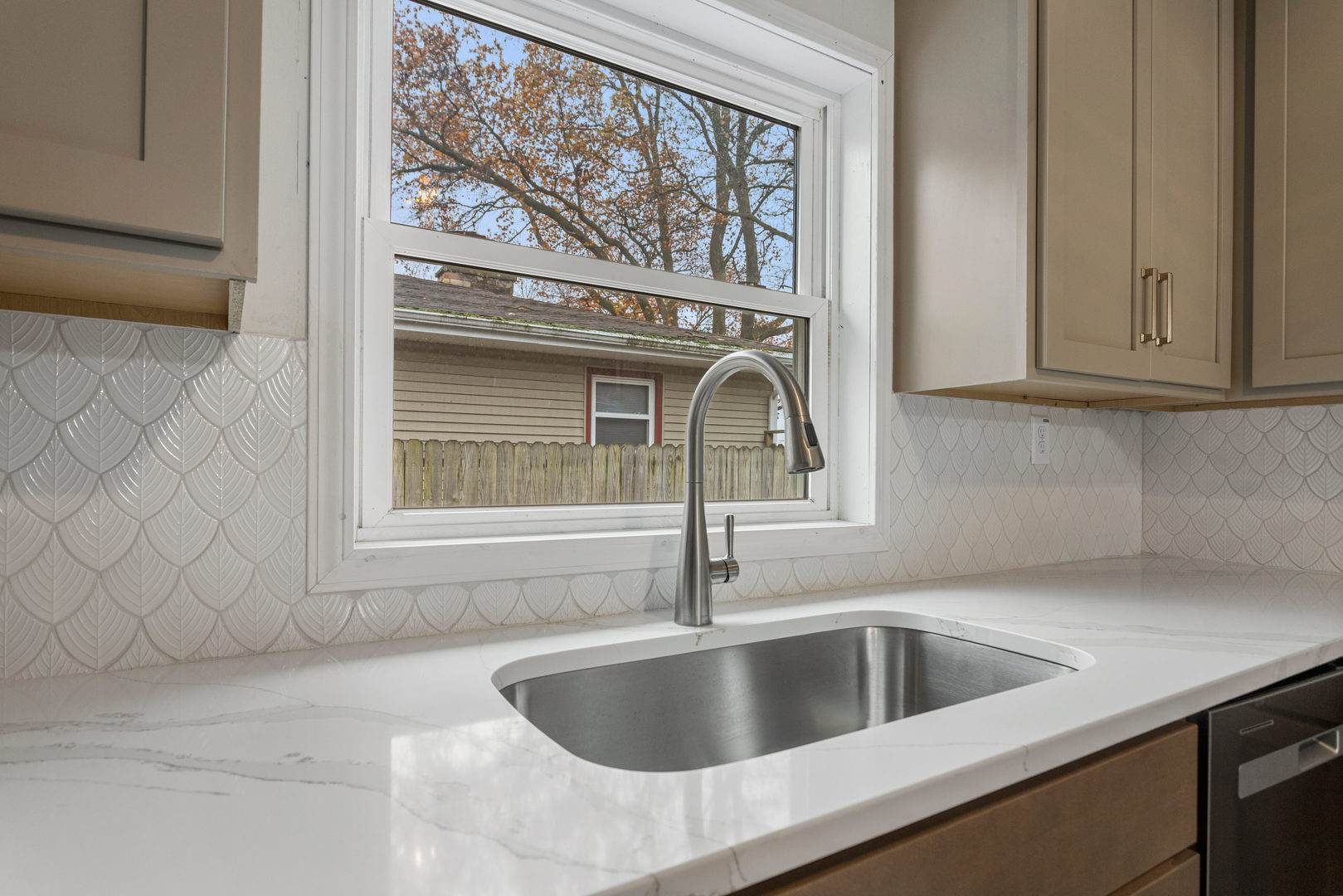 807 South Hamilton Street Monticello, IL 61856 - Photo 18 of 39 a kitchen with a sink and granite top
