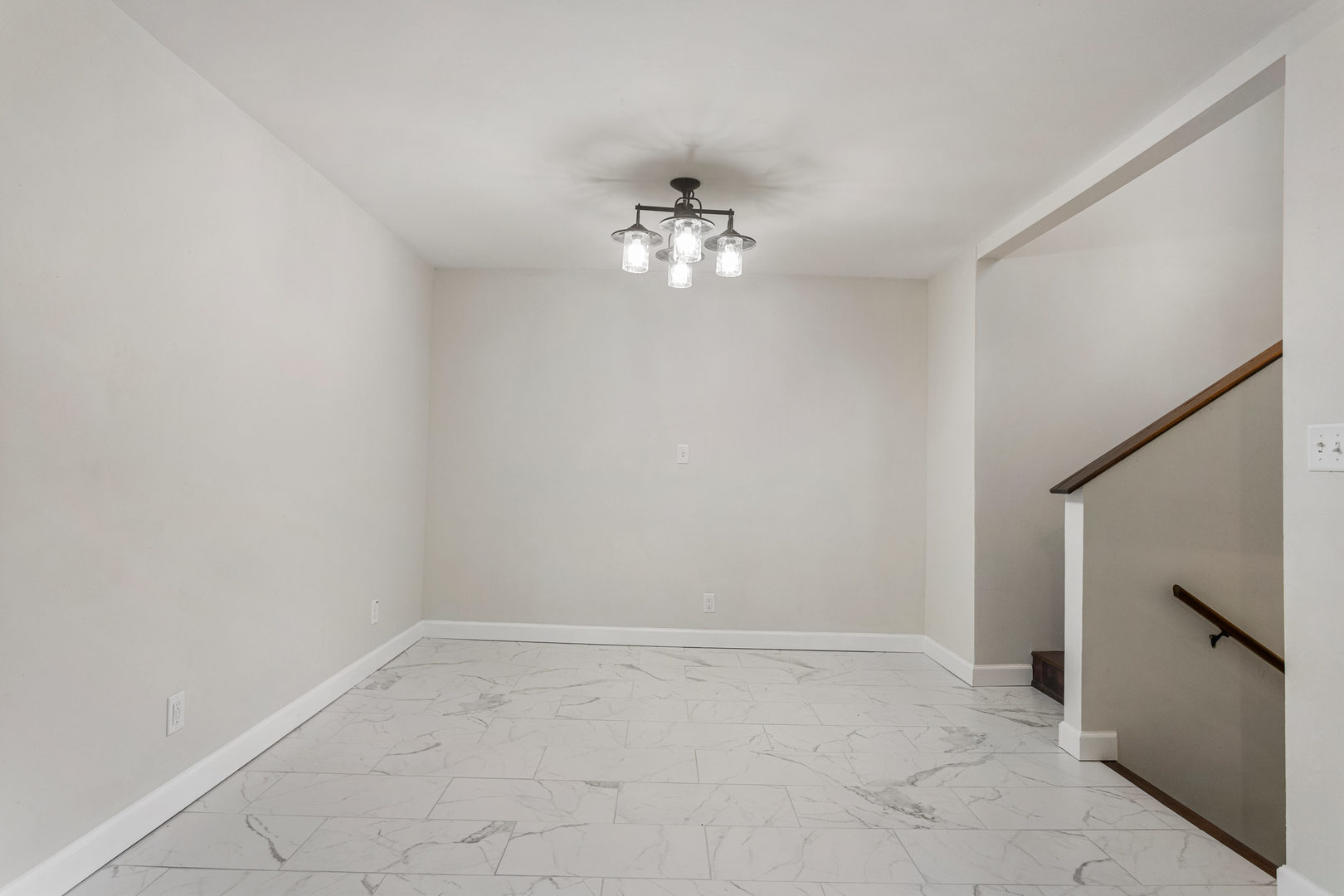 807 South Hamilton Street Monticello, IL 61856 - Photo 20 of 39 wooden floor in an empty room with a window