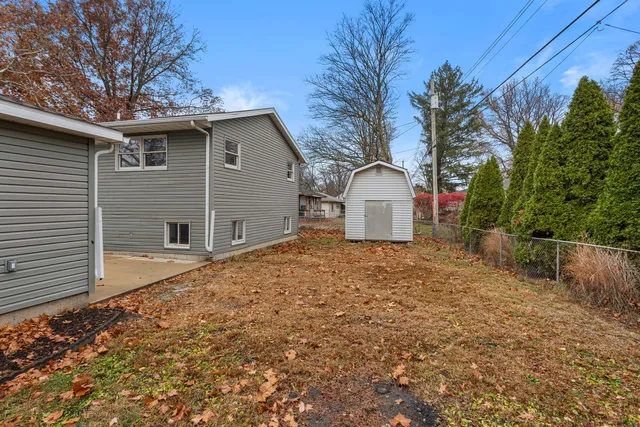 a house with trees in front of it