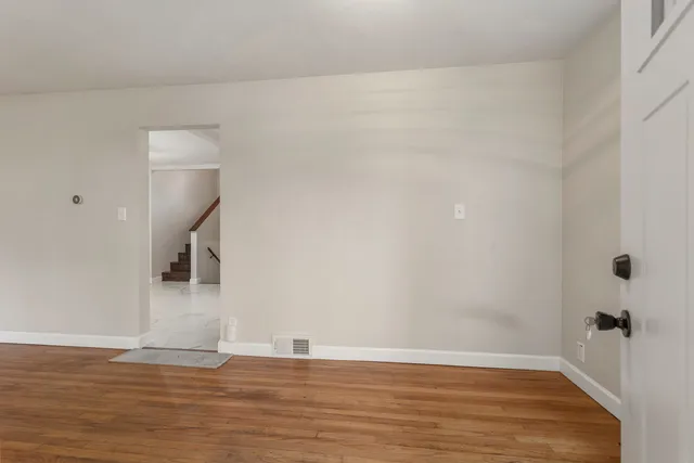 a view of a livingroom with wooden floor