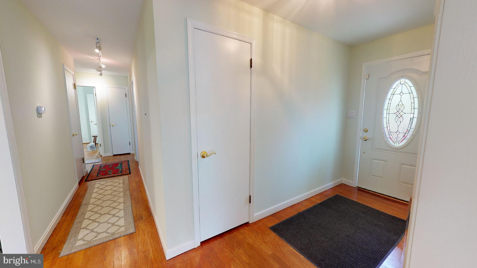 5308 Lanham Station Road Lanham, MD 20706 - Photo 47 of 83 Entry Closet and view of hall to bedrooms