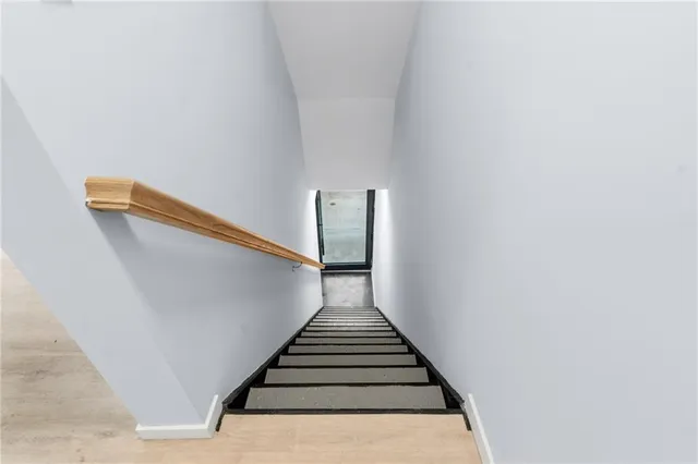 a bathroom with a sink a vanity and a mirror