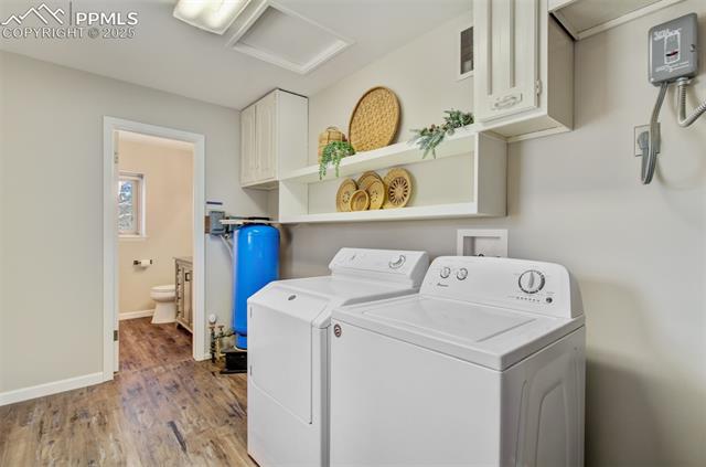 749 Aspen Village Road Divide, CO 80814 - Photo 19 of 49 laundry room includes the washer and dryer and opens to a half bath