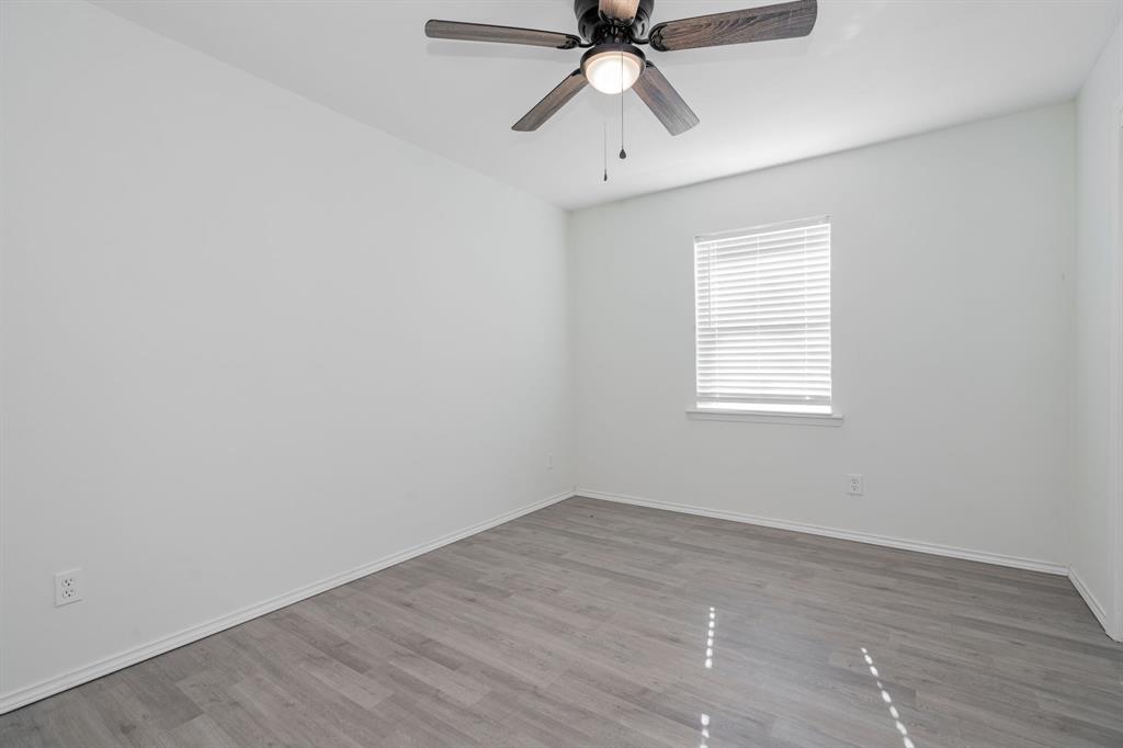 508 Rogers Way Rockwall, TX 75087 - Photo 16 of 25 an empty room with a window and a fan