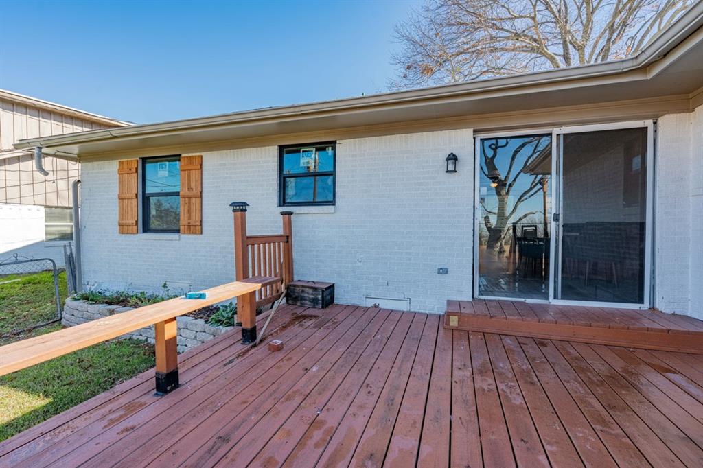 508 Rogers Way Rockwall, TX 75087 - Photo 22 of 25 a front view of a house with barbeque oven and furniture