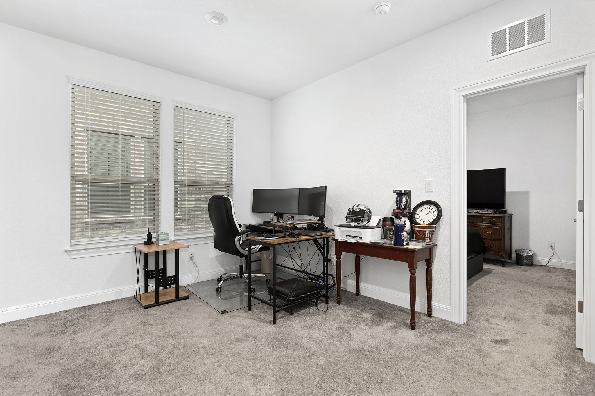 116 Raleigh Drive Georgetown, TX 78633 - Photo 15 of 28 A well-lit bonus room provides a versatile space, perfect for a home office or creative pursuits.