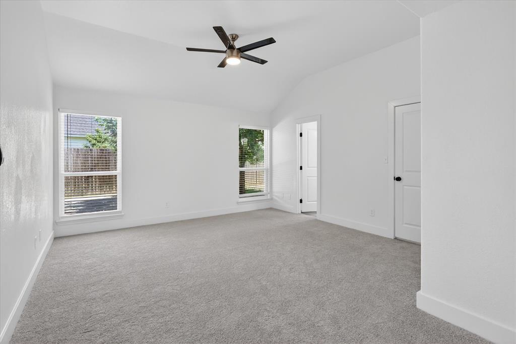6021 Hartman Road Forest Hill, TX 76119 - Photo 15 of 27 an empty room with windows and way to ceiling window