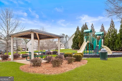 a view of a house with a swimming pool