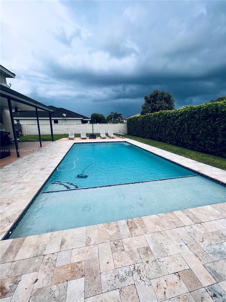 12780 Southwest 224th Street Miami, FL 33170 - Photo 29 of 29 a view of swimming pool with seating space