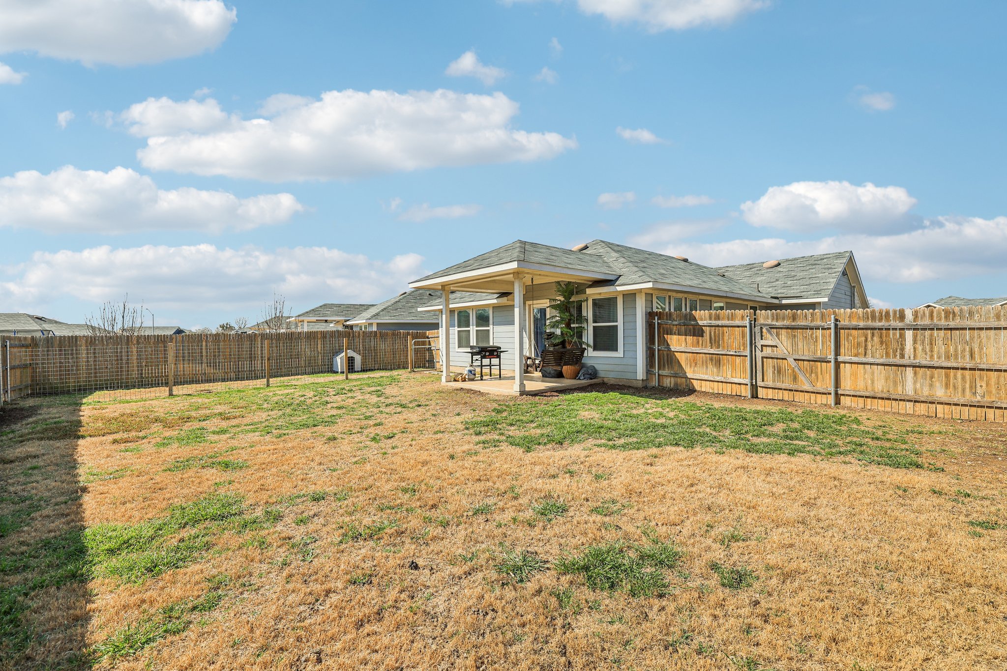 111 Insider Loop Elgin, TX 78621 - Photo 39 of 39 a view of a house with a yard and sitting area