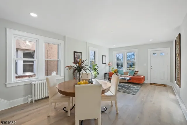 a view of a livingroom with furniture and a window