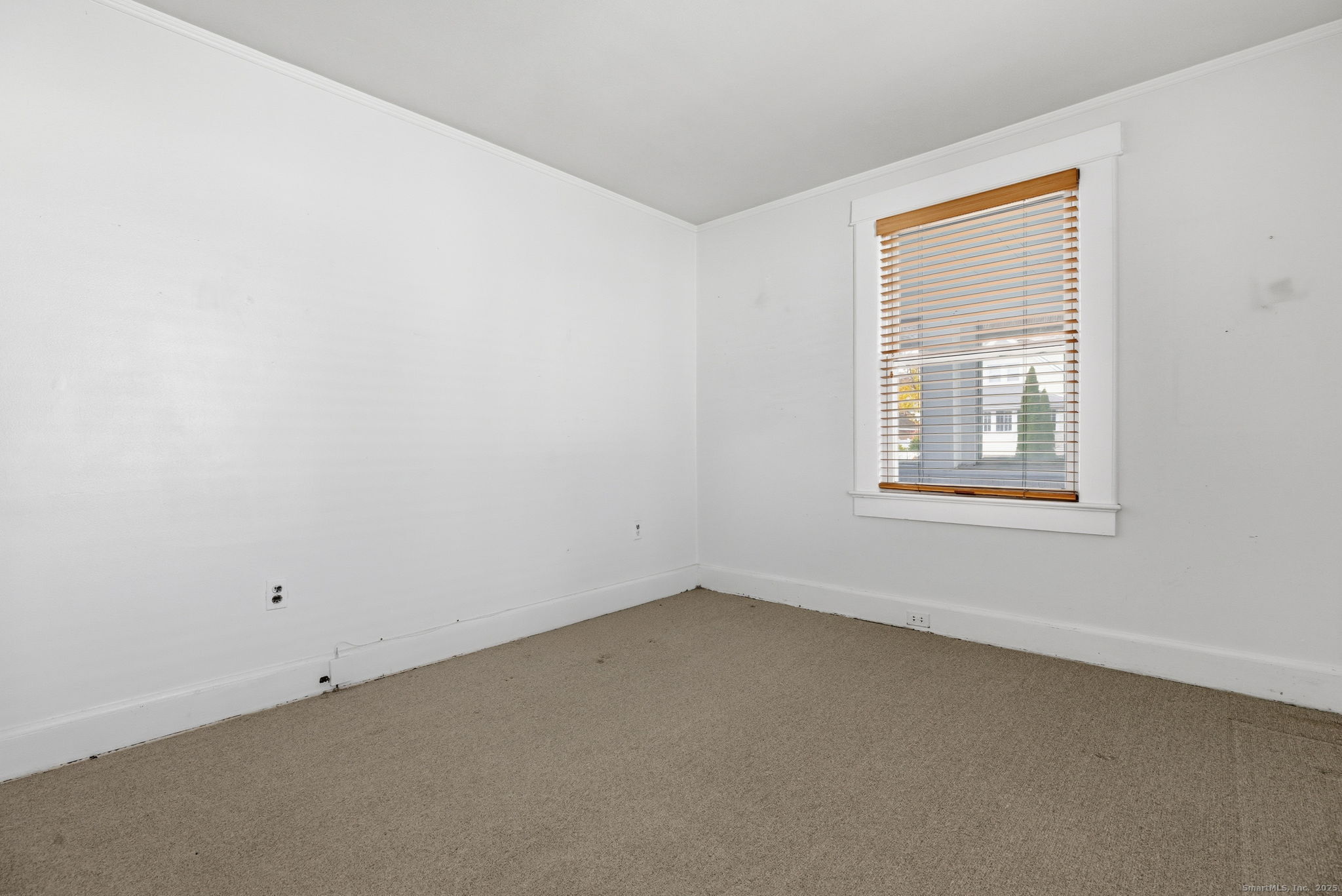41 Sterling Place, Unit 1 Stamford, CT 06907 - Photo 17 of 29 an empty room with a window