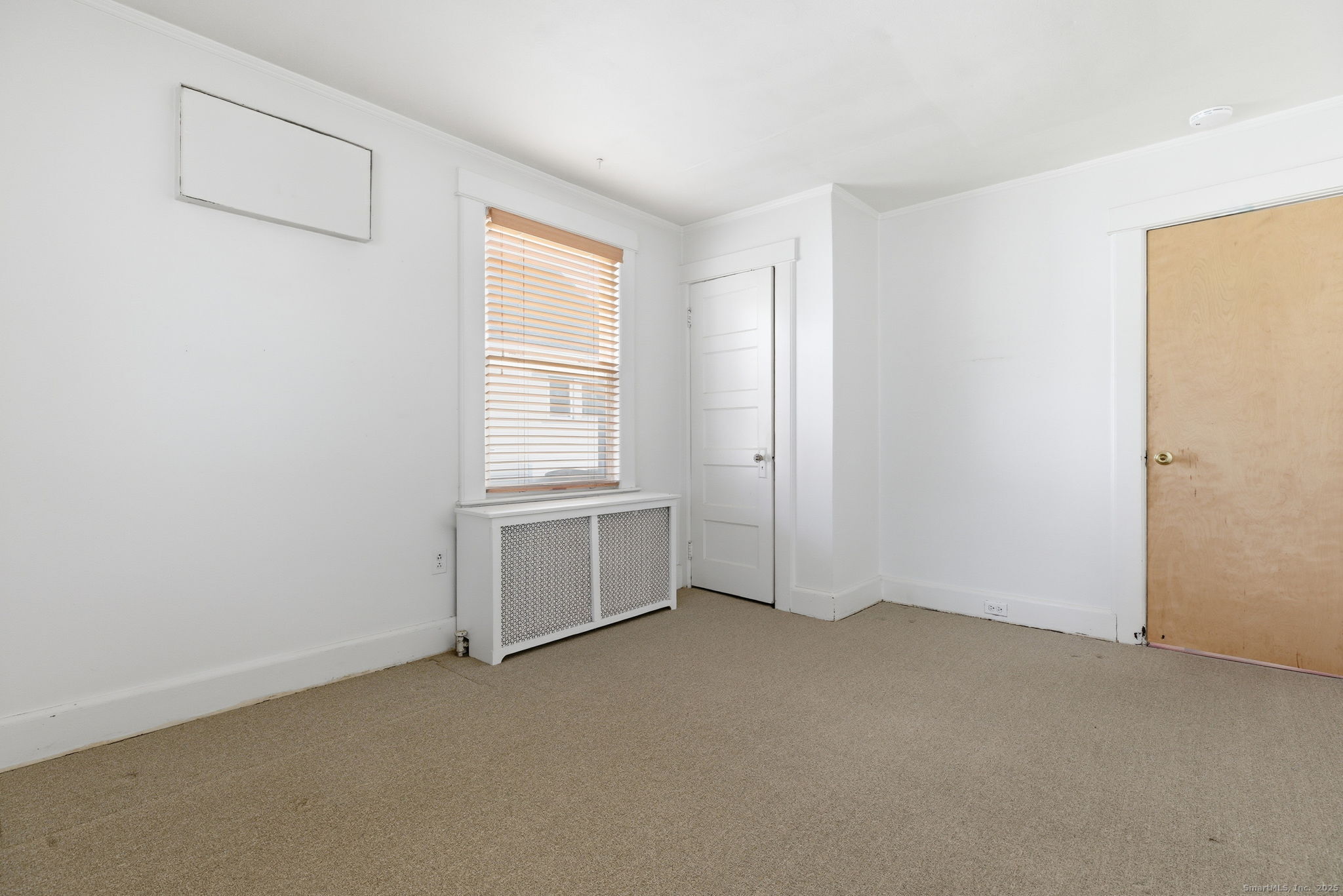 41 Sterling Place, Unit 1 Stamford, CT 06907 - Photo 18 of 29 a view of an empty room with a window