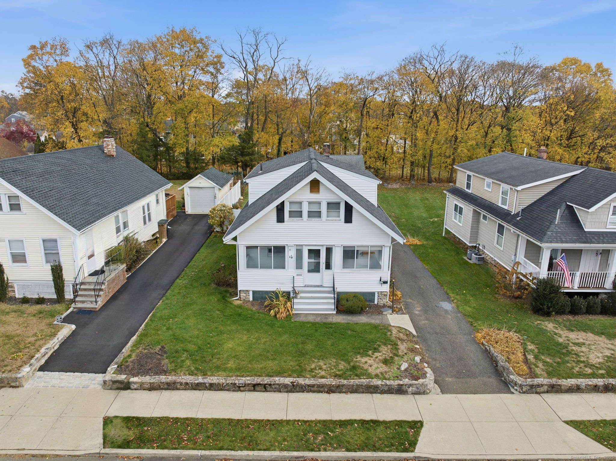 41 Sterling Place, Unit 1 Stamford, CT 06907 - Photo 2 of 29 a view of house with a yard and potted plants