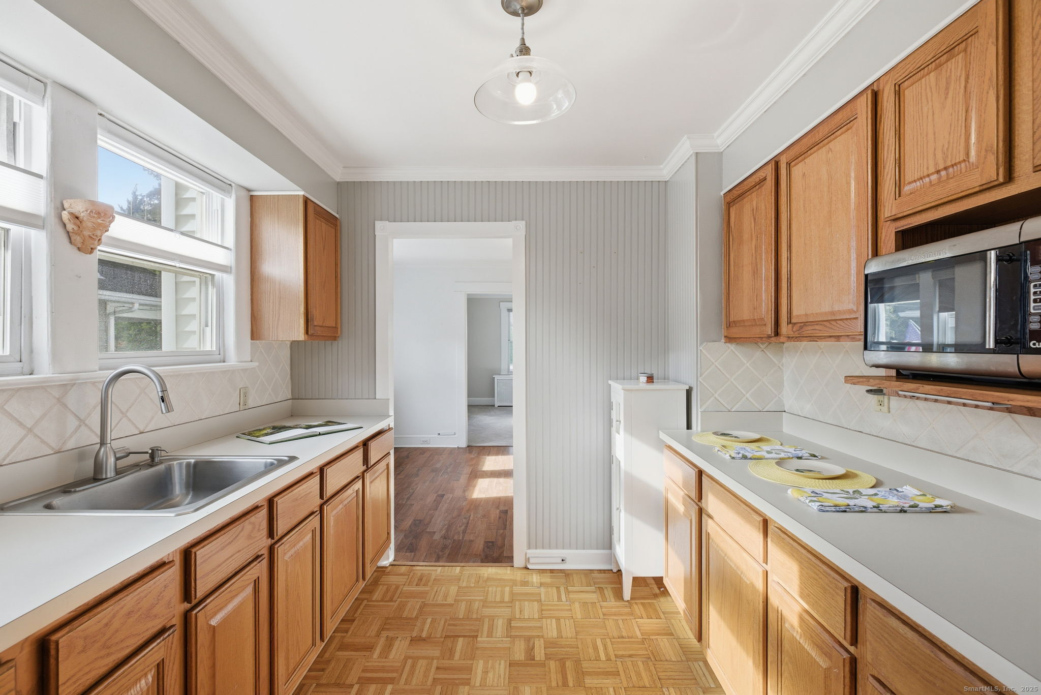 41 Sterling Place, Unit 1 Stamford, CT 06907 - Photo 10 of 29 a kitchen that has a sink and a stove top oven