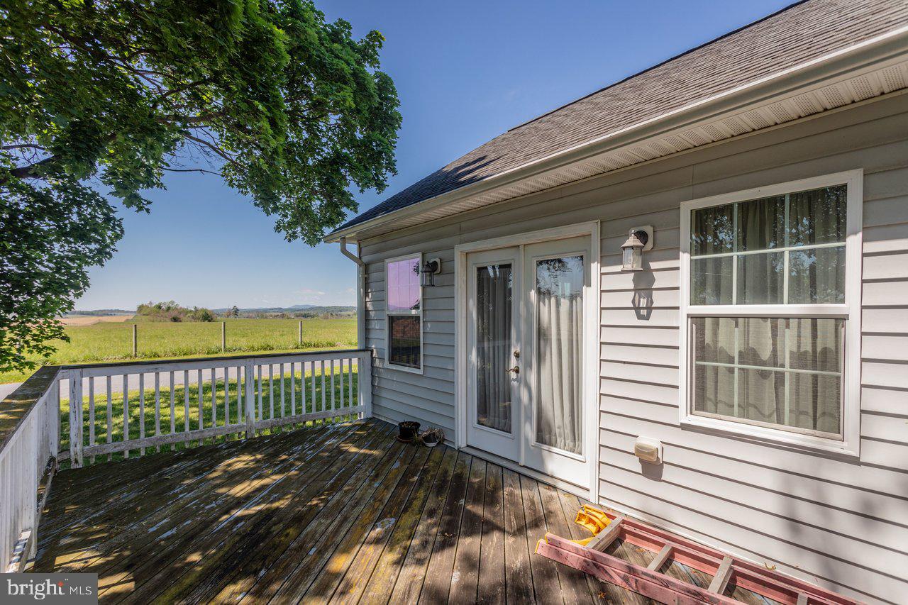 1751 Orchard Road Mount Jackson, VA 22842 - Photo 26 of 30 a view of a house with a wooden fence
