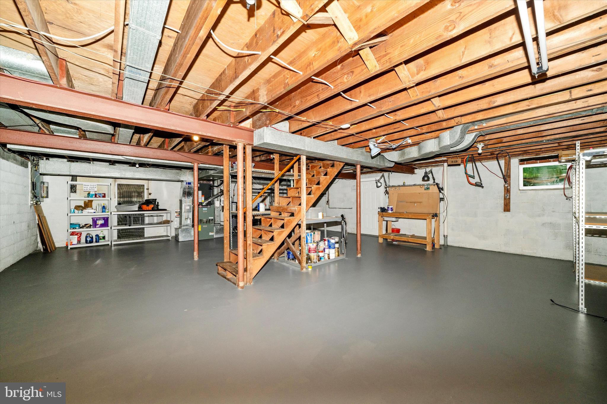 1100 Notley Road Silver Spring, MD 20904 - Photo 41 of 54 Expansive basement/workshop with walk-up to yard