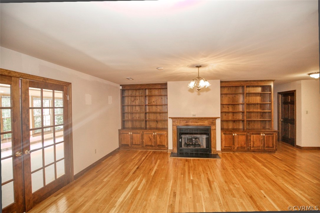 9620 Old Forge Road Providence Forge, VA 23140 - Photo 8 of 39 Family room with Gas Fireplace and Built In Bookca