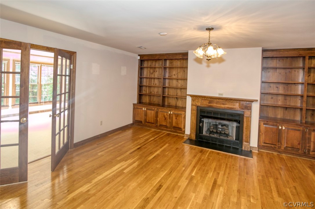 9620 Old Forge Road Providence Forge, VA 23140 - Photo 9 of 39 Family Room showing Double French Doors to Sunroom