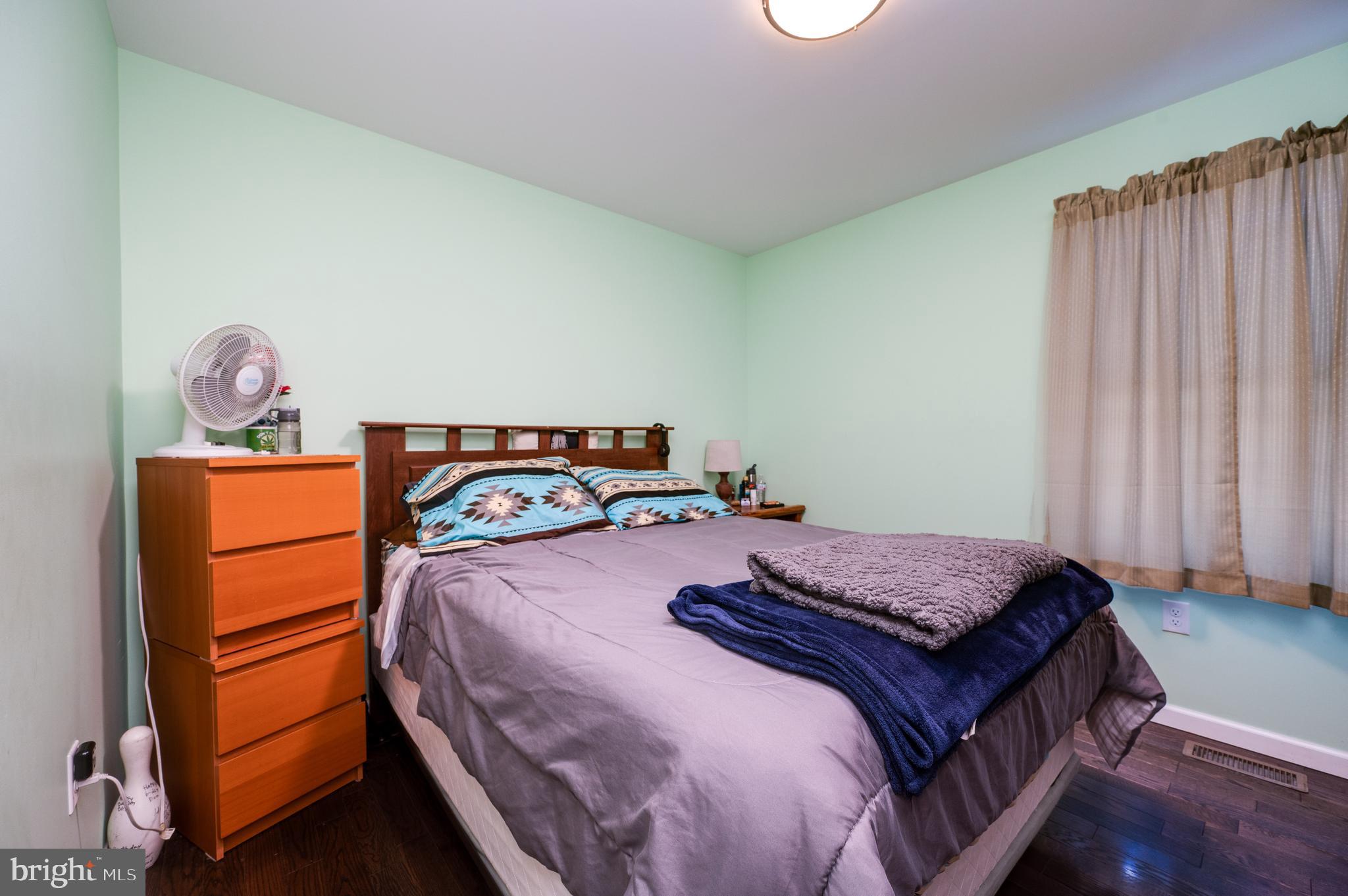 1133 Ashbourne Drive Reading, PA 19605 - Photo 27 of 64 a bedroom with a bed and a window