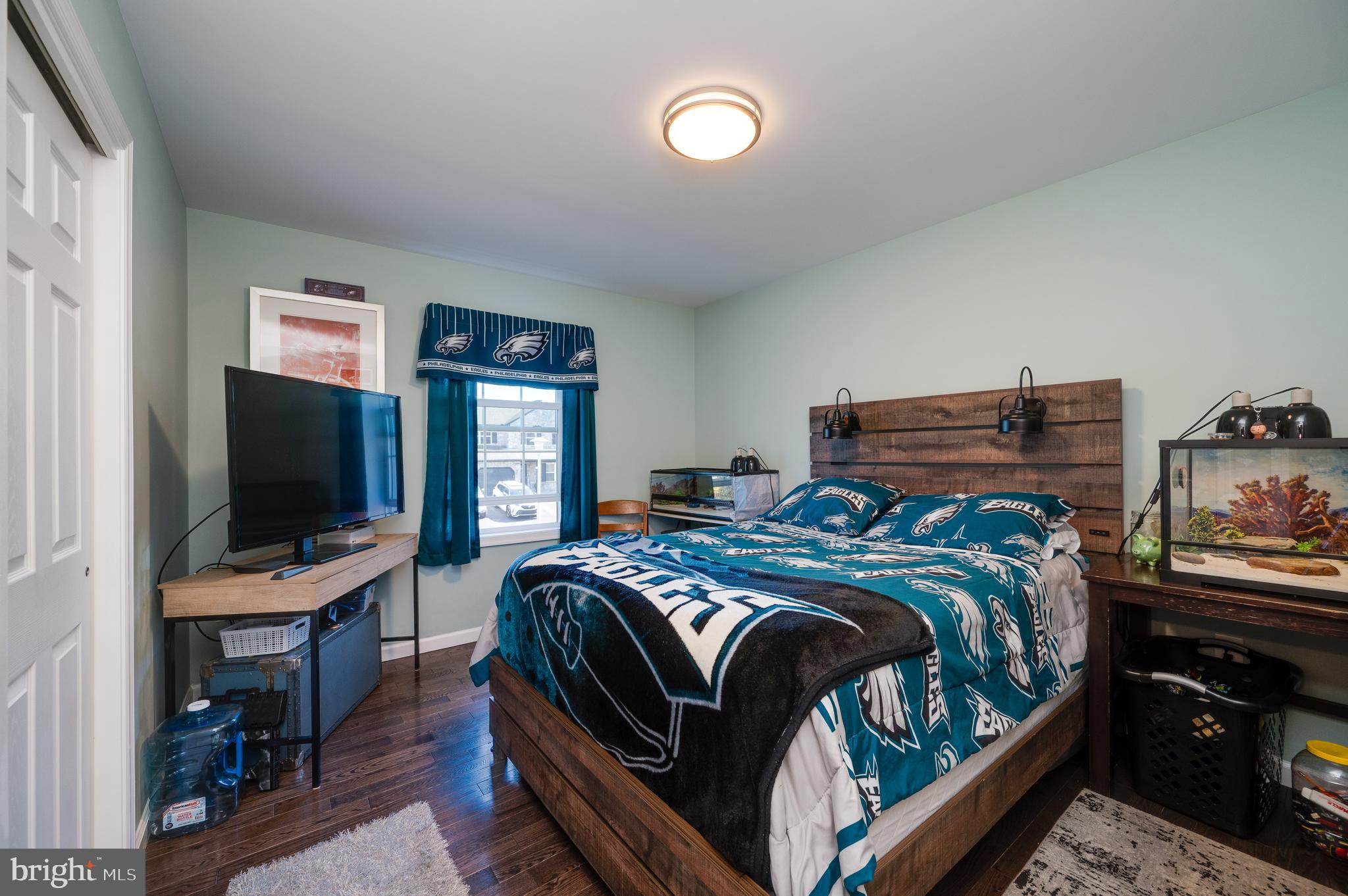 1133 Ashbourne Drive Reading, PA 19605 - Photo 30 of 64 a bedroom with a bed and a flat screen tv
