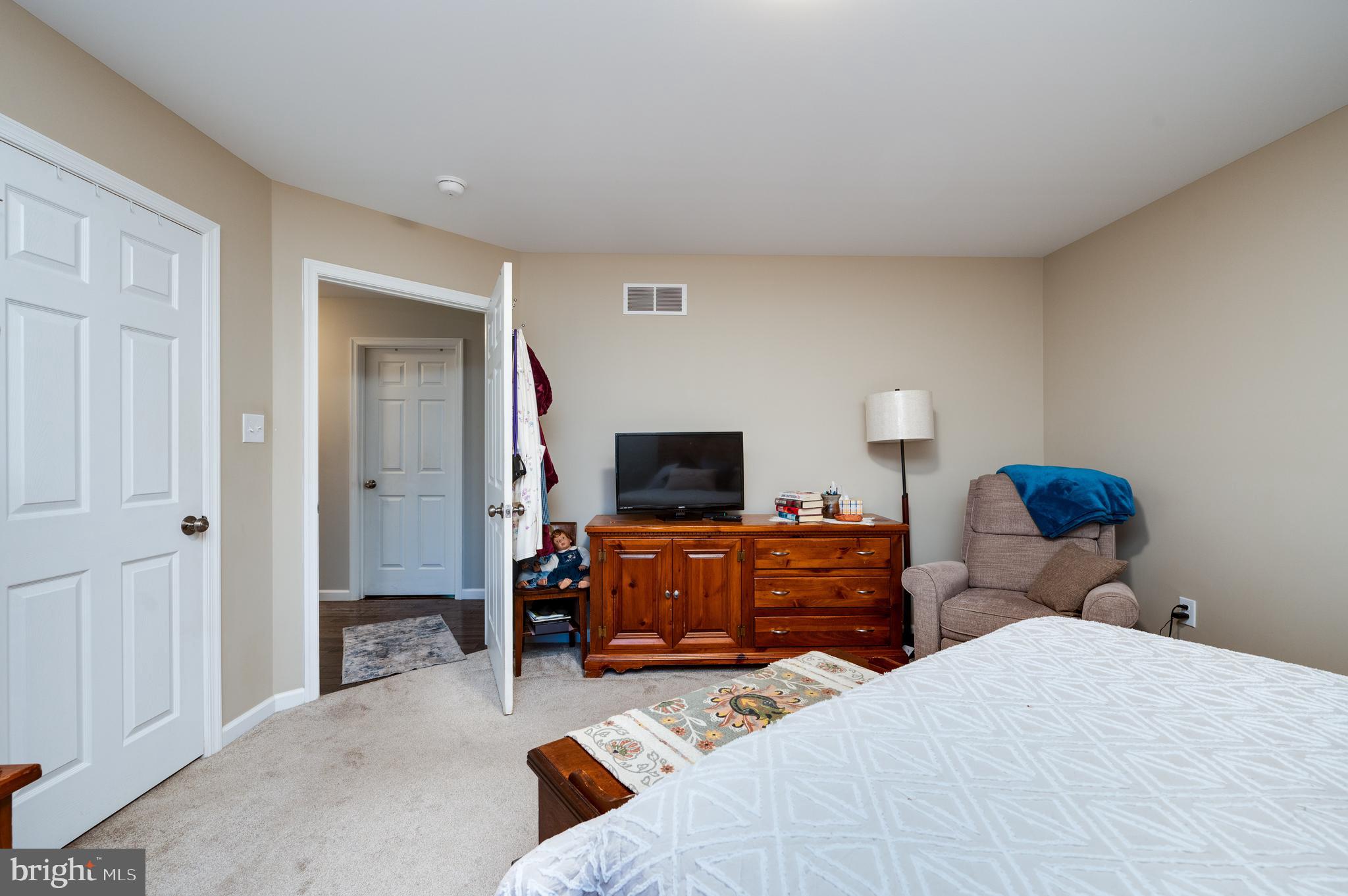 1133 Ashbourne Drive Reading, PA 19605 - Photo 35 of 64 a bedroom with two beds and a television