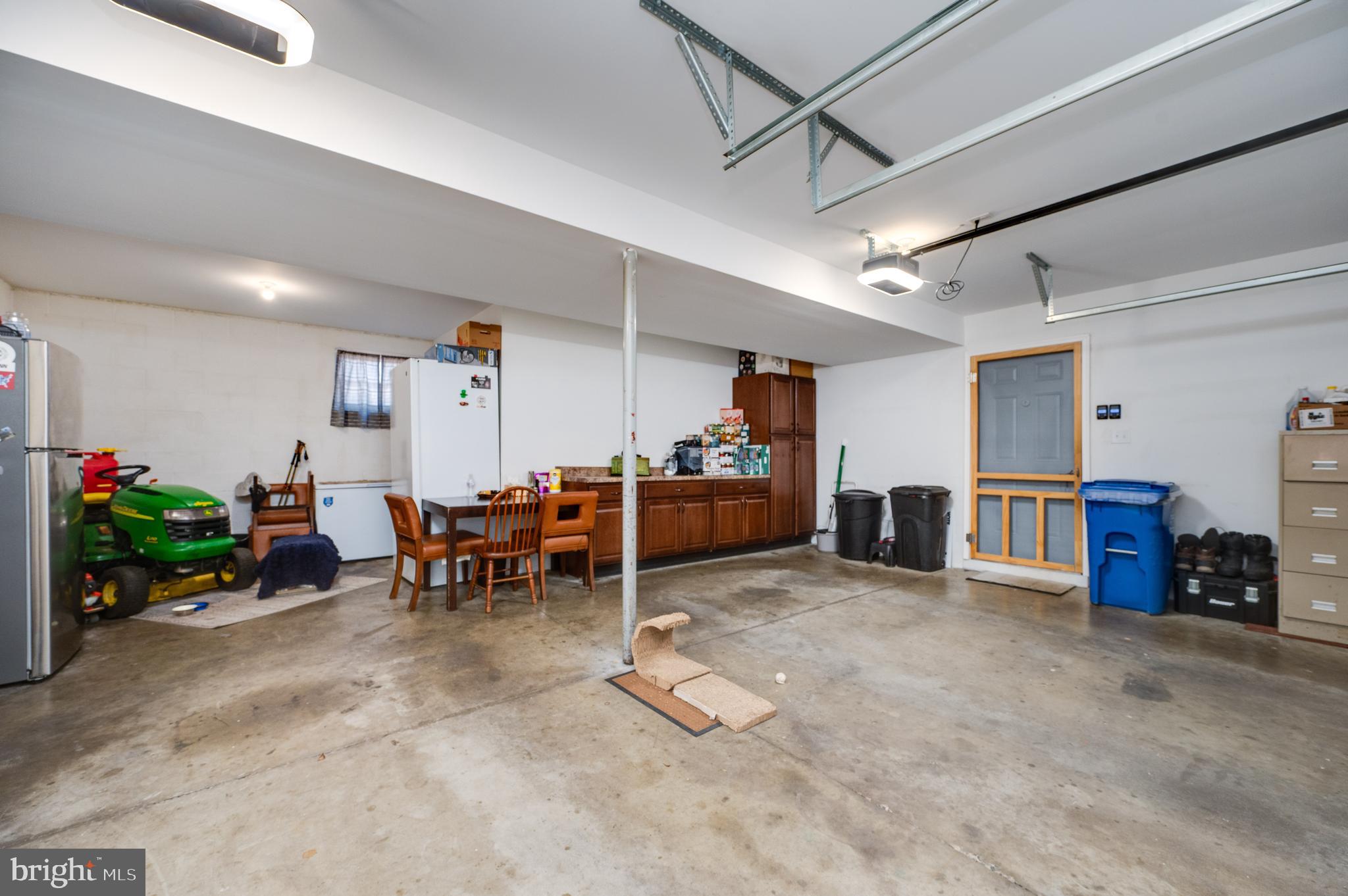 1133 Ashbourne Drive Reading, PA 19605 - Photo 49 of 64 a living room with furniture and a dining table