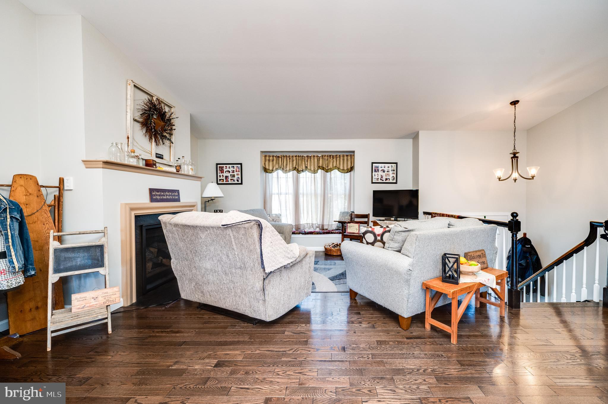 1133 Ashbourne Drive Reading, PA 19605 - Photo 5 of 64 a living room with furniture and a fireplace