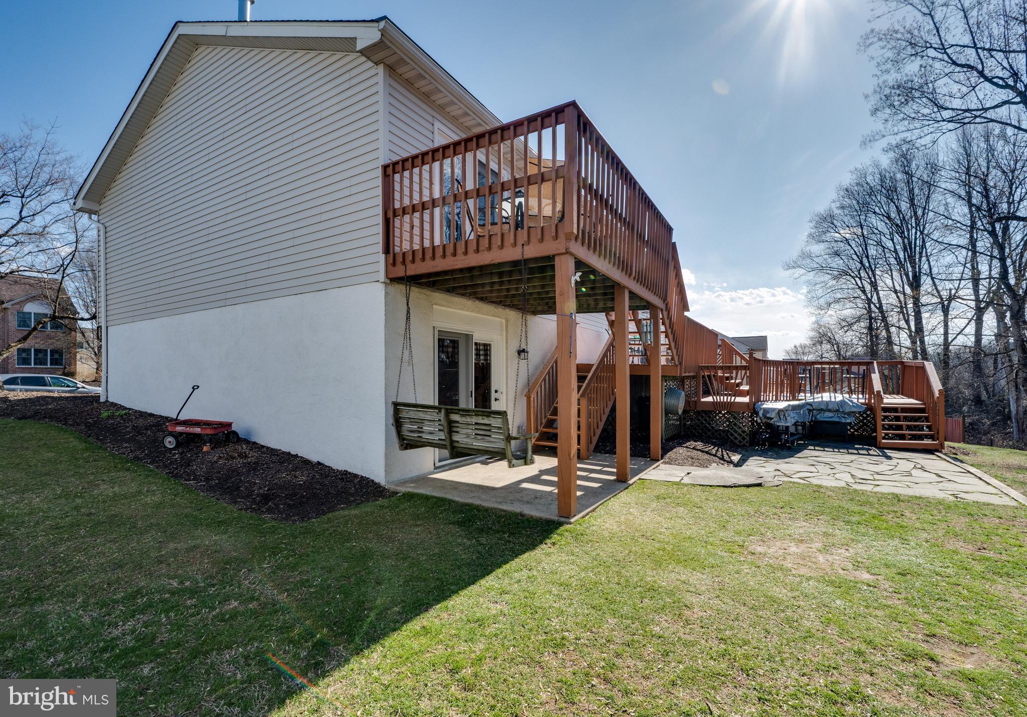 1133 Ashbourne Drive Reading, PA 19605 - Photo 53 of 64 a view of a backyard with sitting area