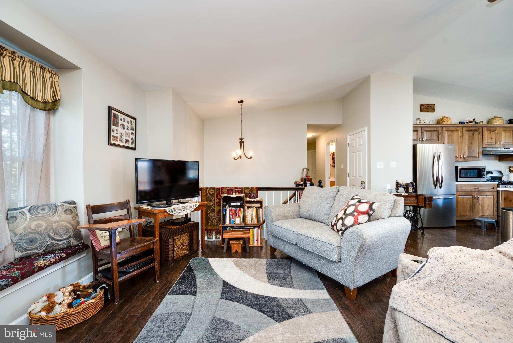 1133 Ashbourne Drive Reading, PA 19605 - Photo 8 of 64 a living room with furniture and a flat screen tv