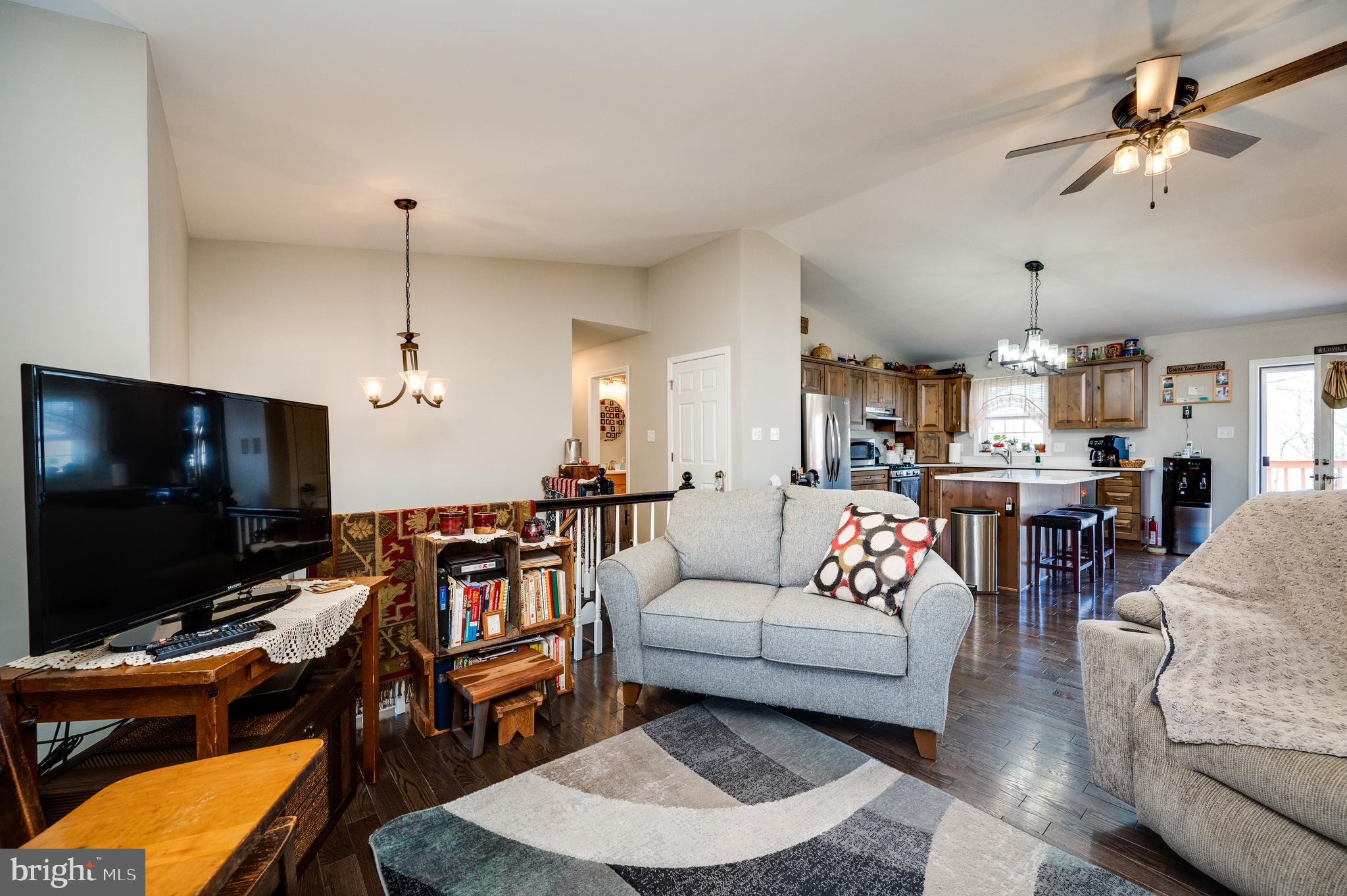 1133 Ashbourne Drive Reading, PA 19605 - Photo 9 of 64 a living room with furniture and a flat screen tv