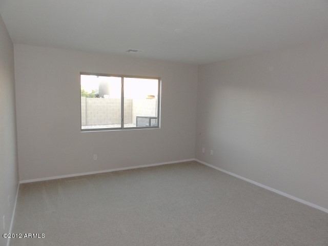 9736 West Heber Road Tolleson, AZ 85353 - Photo 8 of 42 Bedroom 01 (master)-A