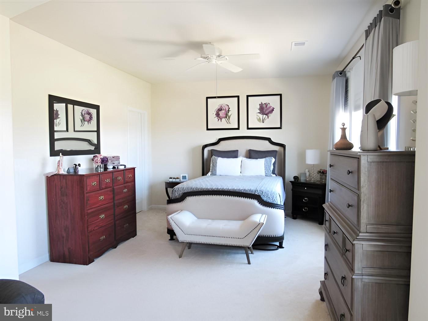 42581 Sunset Ridge Square Ashburn, VA 20148 - Photo 10 of 24 Serene bedroom with floral accents.